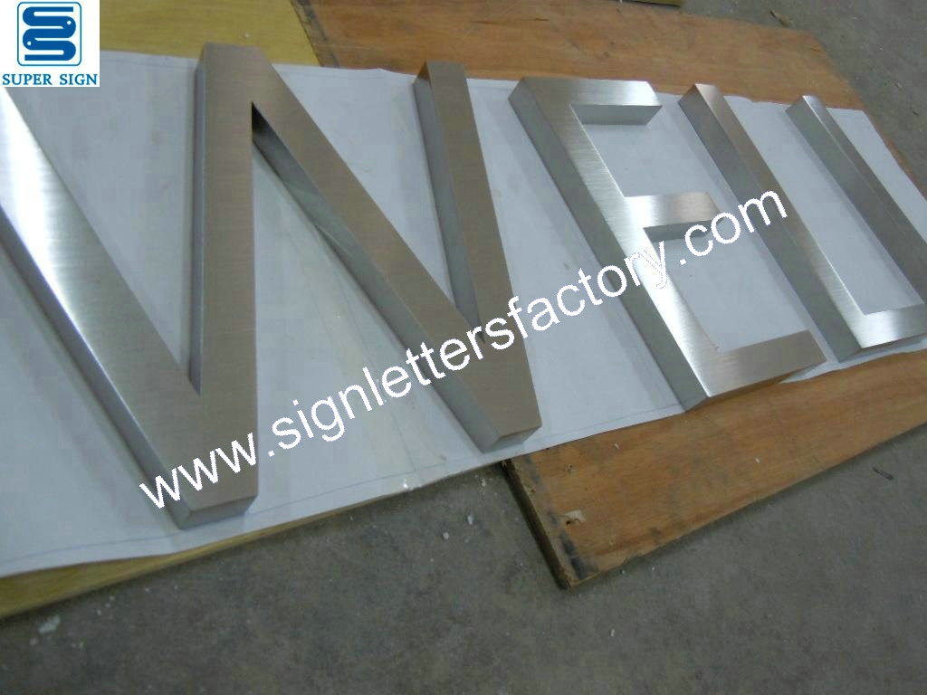 Fabricated brushed stainless steel letters